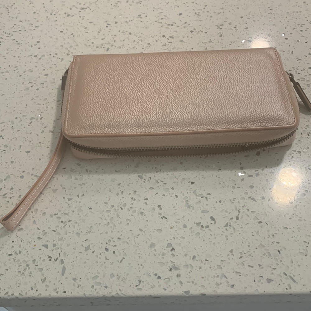 Women wallet with pockets for credit cards and driver’s license.  Barely used